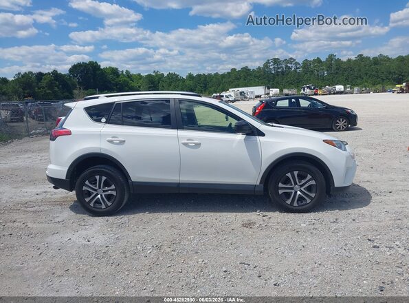 JTMZFREV0HJ713176 2017 TOYOTA RAV4 White უკანა სალონის ხედი