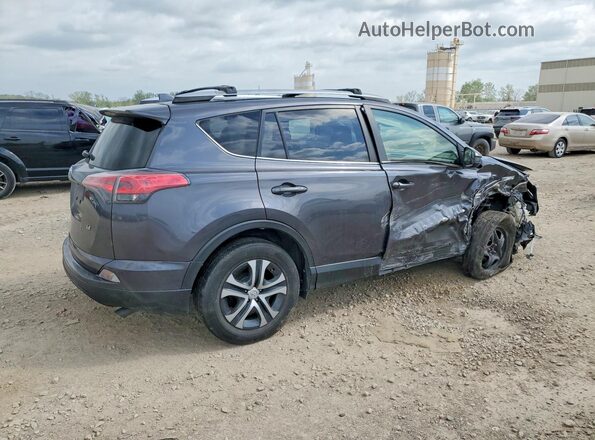 JTMZFREV0HJ716272 2017 TOYOTA RAV4 Gray Trasero derecho