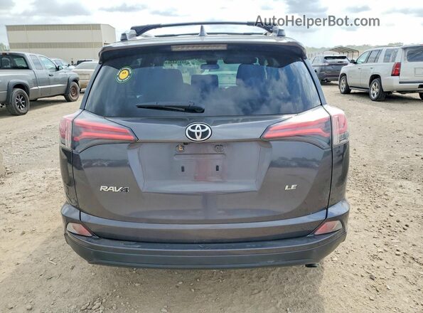 JTMZFREV0HJ716272 2017 TOYOTA RAV4 Gray Vista trasera