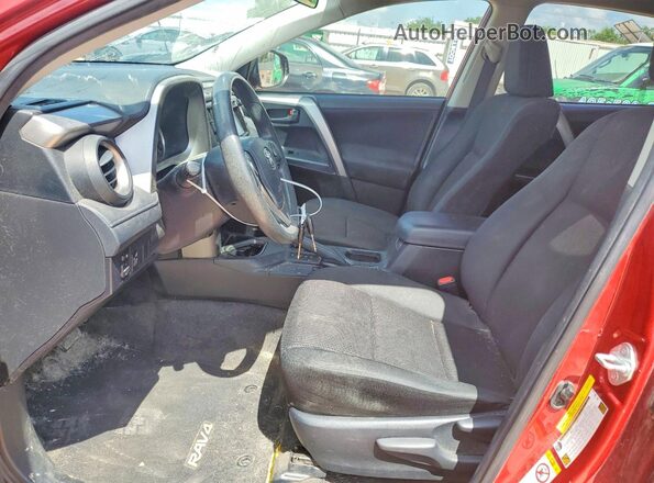 JTMZFREV1GJ091721 2016 TOYOTA RAV4 Red Widok wnętrza z przodu
