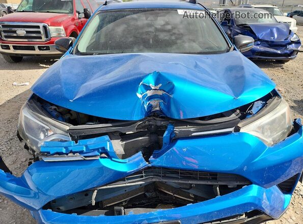 JTMZFREV1JJ745155 2018 TOYOTA RAV4 Blue Vista interior trasera