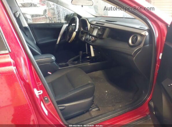 JTMZFREV2GJ096443 2016 TOYOTA RAV4 Red წინა სალონის ხედი