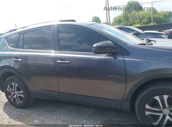 JTMZFREV2HJ104123 2017 TOYOTA RAV4 Серый Вид задней части салона