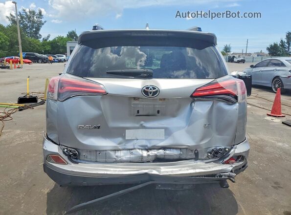 JTMZFREV2JJ196162 2018 TOYOTA RAV4 Серебряный Вид сзади