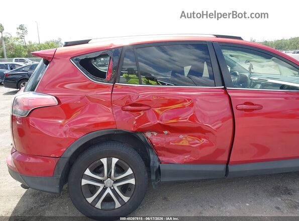 JTMZFREV3GJ099237 2016 TOYOTA RAV4 Red Դիմացի տեսք