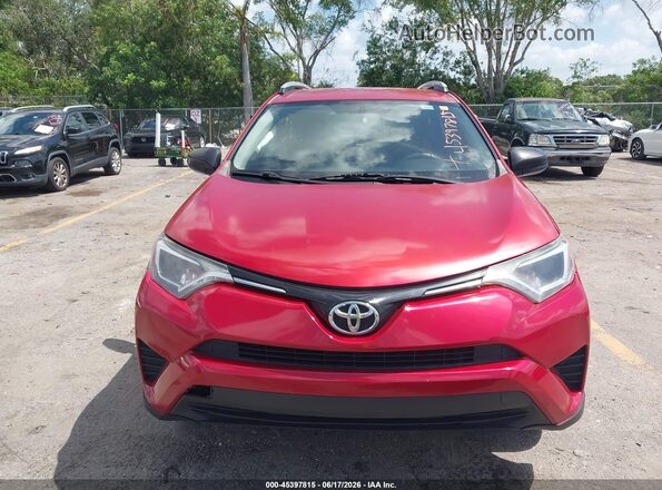JTMZFREV3GJ099237 2016 TOYOTA RAV4 Red Սարքավորումների վահանակի տեսք