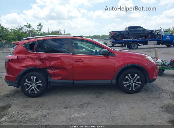 JTMZFREV3GJ099237 2016 TOYOTA RAV4 Red Սալոնի հետևի տեսք