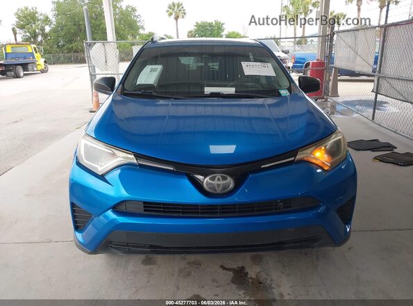 JTMZFREV3JJ178463 2018 TOYOTA RAV4 Blue Вид задньої частини салону