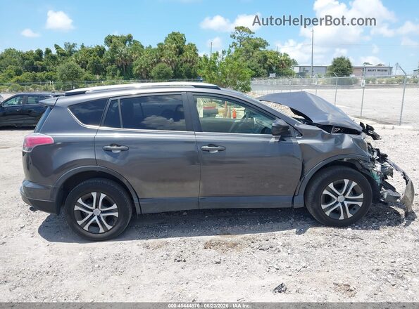 JTMZFREV3JJ183498 2018 TOYOTA RAV4 Gray Rear interior view