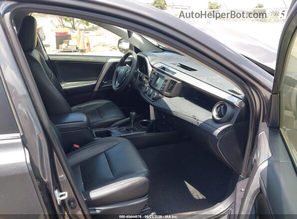 JTMZFREV3JJ183498 2018 TOYOTA RAV4 Gray Front interior view