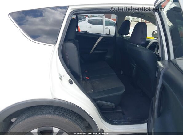 JTMZFREV3JJ211090 2018 TOYOTA RAV4 White Widok naklejki z numerem VIN