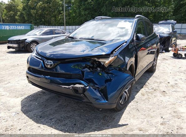 JTMZFREV3JJ731502 2018 TOYOTA RAV4 Dark Blue Front view