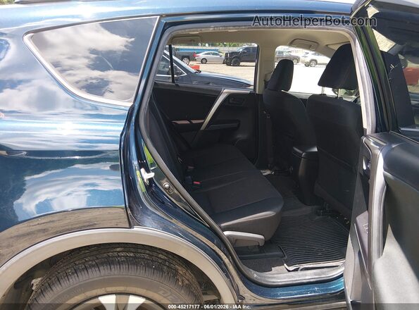 JTMZFREV3JJ731502 2018 TOYOTA RAV4 Dark Blue VIN sticker view