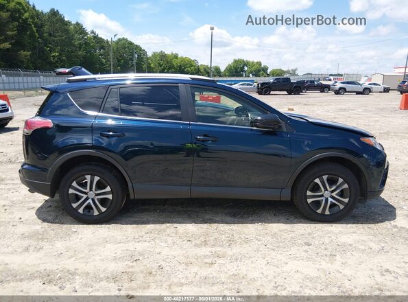 JTMZFREV3JJ731502 2018 TOYOTA RAV4 Dark Blue Rear interior view