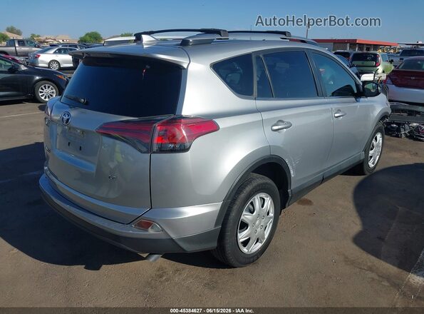 JTMZFREV4JJ169299 2018 TOYOTA RAV4 Silver Հետևի աջ