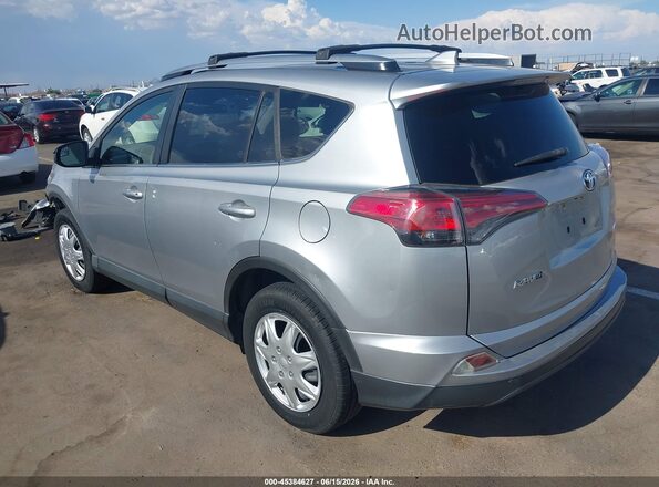JTMZFREV4JJ169299 2018 TOYOTA RAV4 Silver Հետևի ձախ