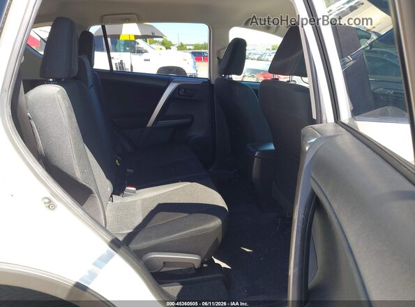 JTMZFREV4JJ737132 2018 TOYOTA RAV4 White VIN კოდის სტიკერის ხედი