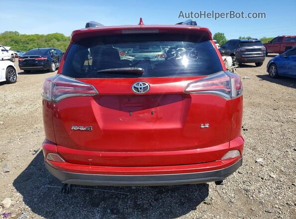 JTMZFREV5GJ065932 2016 TOYOTA RAV4 Burgundy უკანა ხედი