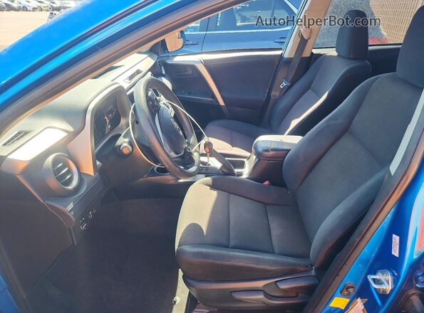 JTMZFREV5HD094539 2017 TOYOTA RAV4 Blue Front interior view