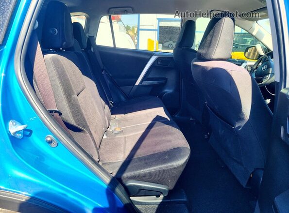 JTMZFREV5HD094539 2017 TOYOTA RAV4 Blue Rear seats view