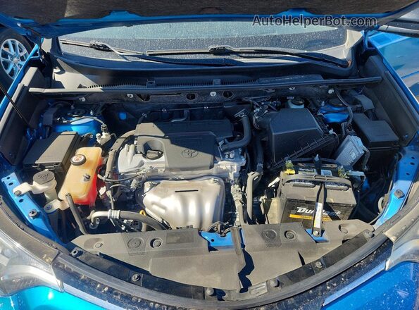 JTMZFREV5HD094539 2017 TOYOTA RAV4 Blue Rear interior view