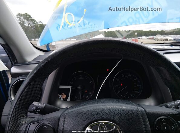 JTMZFREV5HJ135804 2017 TOYOTA RAV4 Blue Vista de los asientos traseros