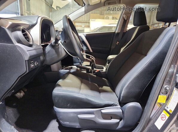 JTMZFREV5JJ158814 2018 TOYOTA RAV4 Charcoal Vista interior delantera