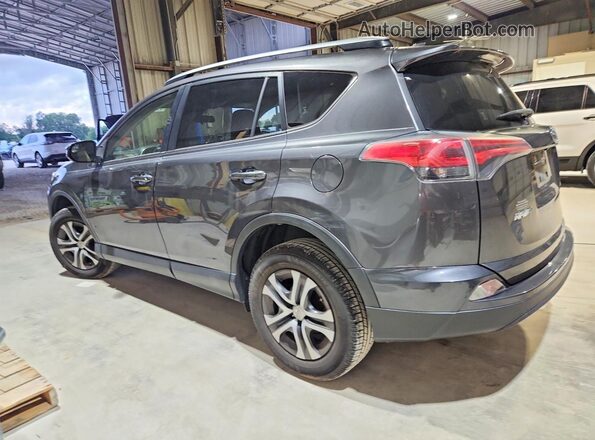 JTMZFREV5JJ158814 2018 TOYOTA RAV4 Charcoal Trasero izquierdo