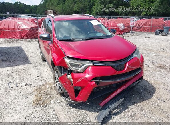 JTMZFREV6GJ100011 2016 TOYOTA RAV4 Red Вид спереду