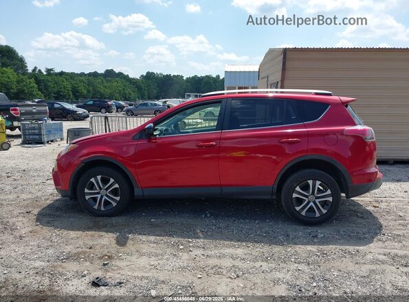 JTMZFREV6GJ100011 2016 TOYOTA RAV4 Red Вид задньої частини салону