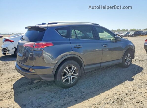 JTMZFREV6JJ742199 2018 TOYOTA RAV4 Gray Rear right