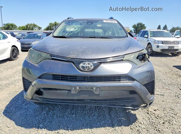 JTMZFREV6JJ742199 2018 TOYOTA RAV4 Gray Front view
