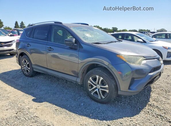 JTMZFREV6JJ742199 2018 TOYOTA RAV4 Gray Front right