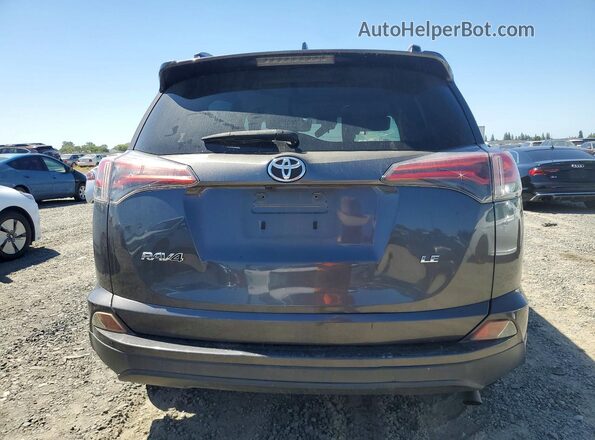 JTMZFREV6JJ742199 2018 TOYOTA RAV4 Gray Rear view