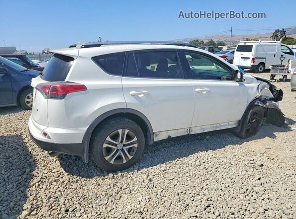 JTMZFREV7HJ100827 2017 TOYOTA RAV4 White Trasero derecho