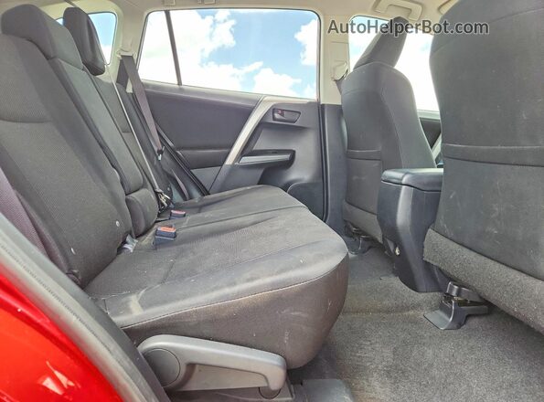 JTMZFREV8GJ077234 2016 TOYOTA RAV4 Red Rear interior view