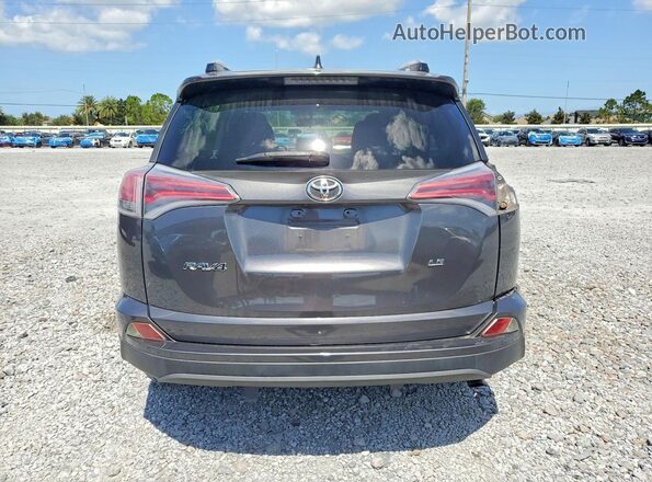 JTMZFREV8GJ082126 2016 TOYOTA RAV4 Gray Вид ззаду