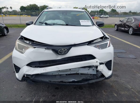 JTMZFREV8JJ186509 2018 TOYOTA RAV4 Белый Вид задней части салона