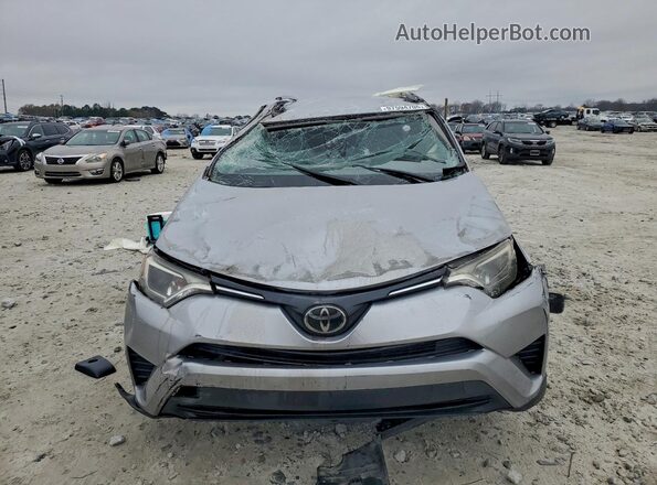 JTMZFREV9JJ185580 2018 TOYOTA RAV4 Gray Դիմացի տեսք