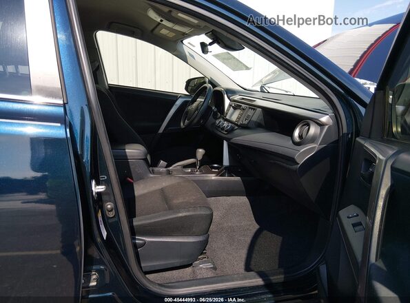 JTMZFREV9JJ736817 2018 TOYOTA RAV4 Navy Вид салона спереди