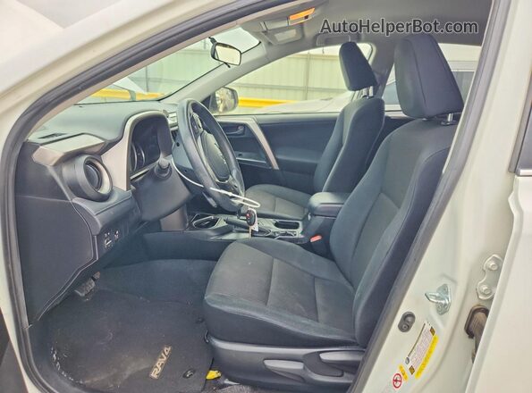 JTMZFREVXGJ065117 2016 TOYOTA RAV4 White Widok wnętrza z przodu