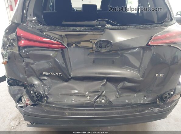 JTMZFREVXGJ078756 2016 TOYOTA RAV4 Gray Front view
