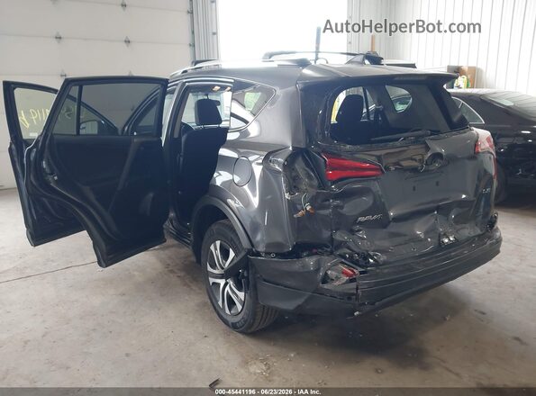 JTMZFREVXGJ078756 2016 TOYOTA RAV4 Gray Rear left