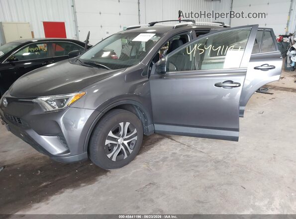 JTMZFREVXGJ078756 2016 TOYOTA RAV4 Gray Front left