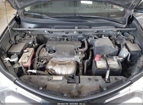 JTMZFREVXGJ078756 2016 TOYOTA RAV4 Gray Rear view
