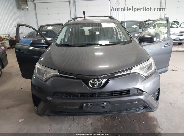 JTMZFREVXGJ078756 2016 TOYOTA RAV4 Gray Rear interior view
