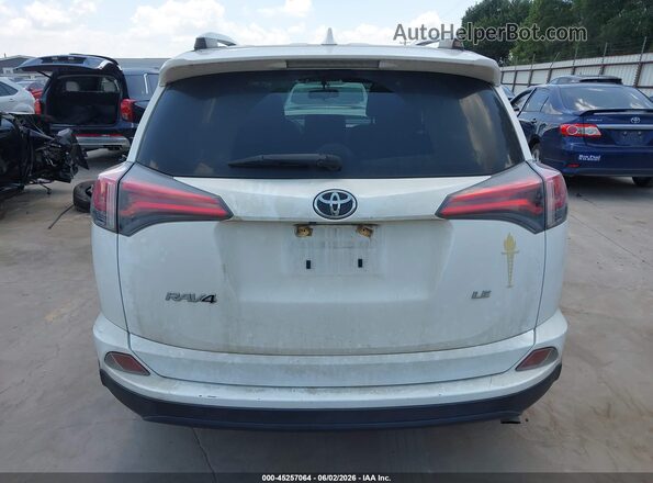 JTMZFREVXGJ096724 2016 TOYOTA RAV4 White 