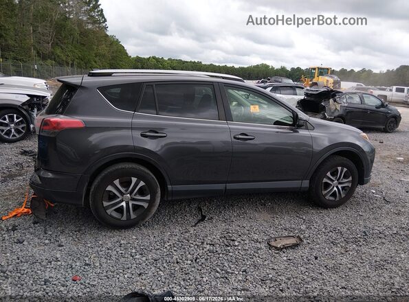 JTMZFREVXHJ129951 2017 TOYOTA RAV4 Gray Вид задньої частини салону