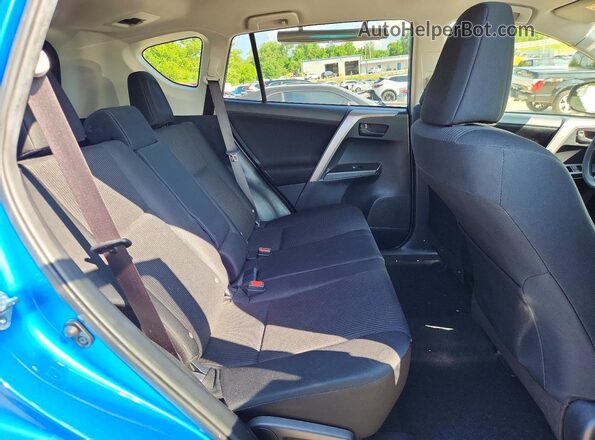 JTMZFREVXHJ717008 2017 TOYOTA RAV4 Blue Vista interior trasera