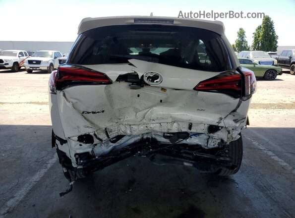 JTMZFREVXJJ748135 2018 TOYOTA RAV4 White Rear view